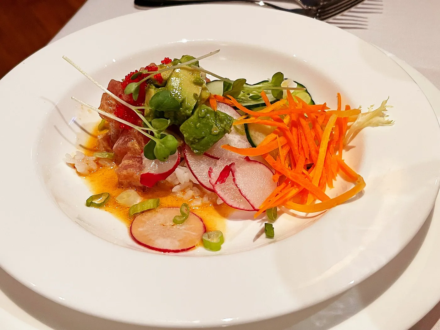 A plated tuna poke